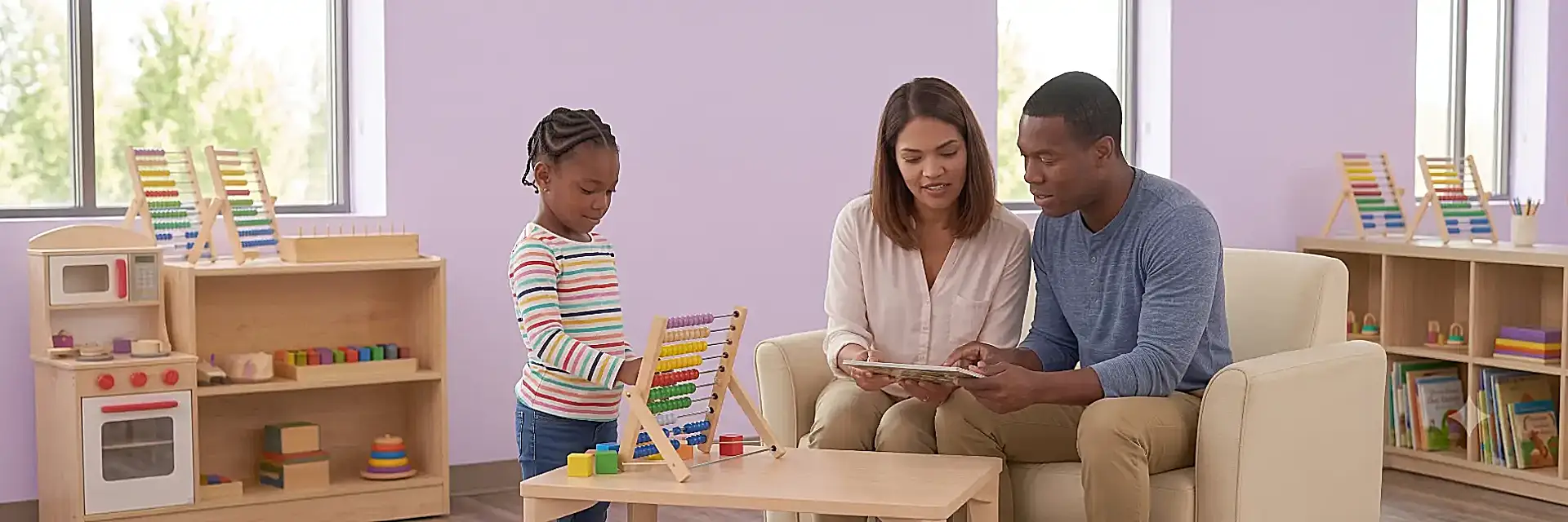 Family participating alongside their child with developmental delays in an ABA therapy session at Children's Center, highlighting the collaborative family approach